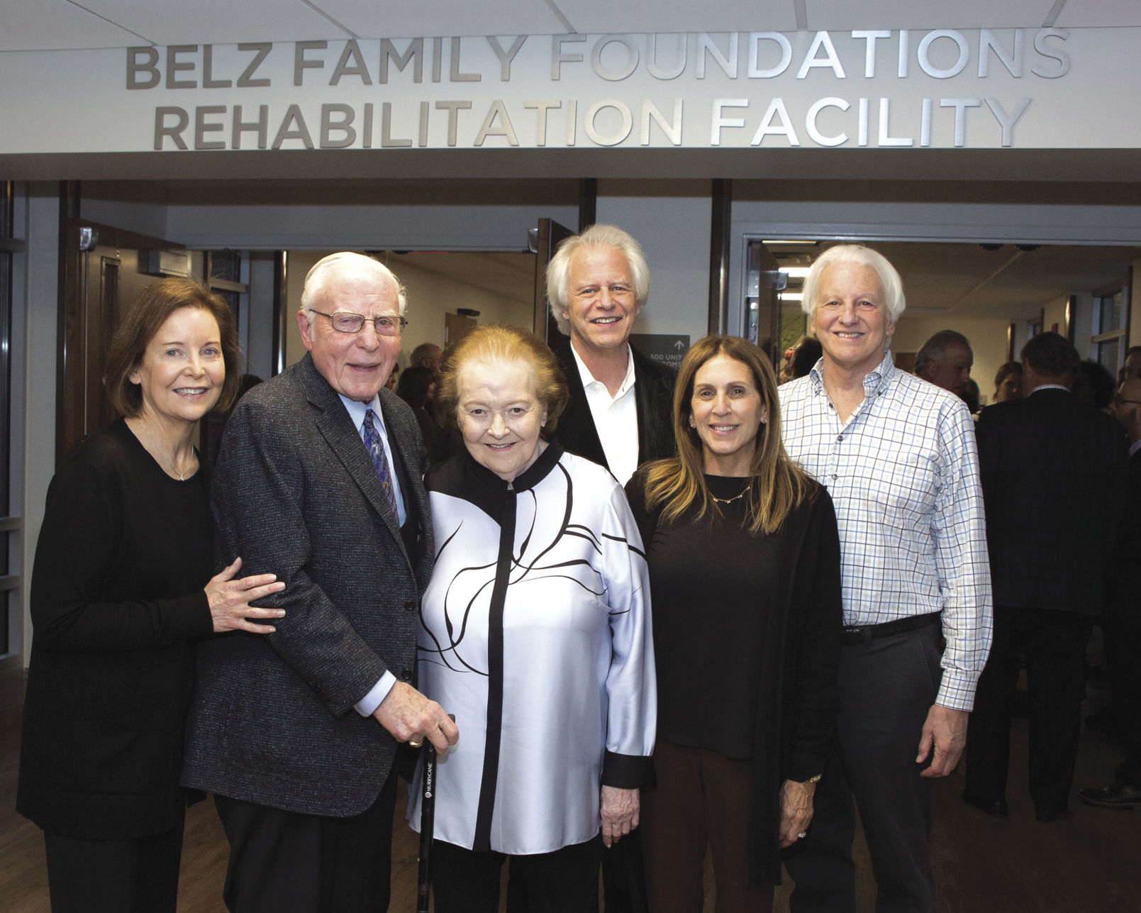The Belz family celebrating the ribbon cutting
